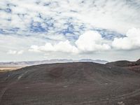 Off-Road Dirt Track in Highland Mountain Landscape