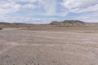 the vast area with rocks and plants on both sides of it is not covered by many people