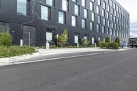 this is an image of a black building in the city area of stockholm, sweden