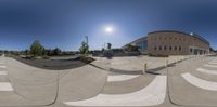 a photograph taken at the skate park in a reflection with a person on one side and another half at the bottom