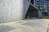 the building is made out of concrete blocks and there is no fire hydrant in front of it