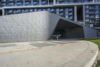 the building is made out of concrete blocks and there is no fire hydrant in front of it