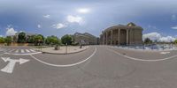 a 360 - 360 image of the view from across a street with two street signs