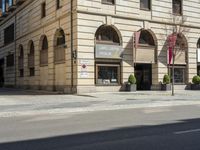 an old building is being used for the advertising purposes of a bike lane on the street