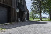 the horse barn and old building have a clock at its side as if to do not have a number on them