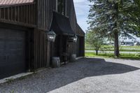 the horse barn and old building have a clock at its side as if to do not have a number on them