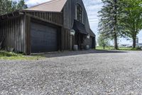 the horse barn and old building have a clock at its side as if to do not have a number on them