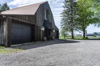 the horse barn and old building have a clock at its side as if to do not have a number on them