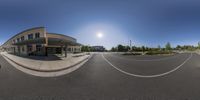 an old business building is pictured in a 360 - angle lens lens to make it look like a small street