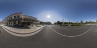 an old business building is pictured in a 360 - angle lens lens to make it look like a small street