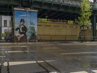 an old photo of a person riding a bicycle on the streets next to a mural