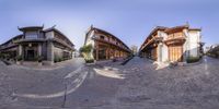 multiple images of a very wide shot of old town street streets as if 360 - zoom