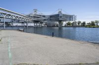 the bridge that crosses over the water from an adjacent building is in use for the city's new headquarters