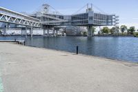 the bridge that crosses over the water from an adjacent building is in use for the city's new headquarters