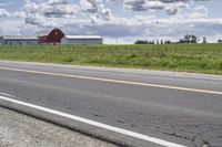 Road in Ontario countryside with trees and blue sky