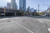 the street view in a city shows a car on a crosswalk in a busy city