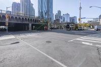 the street view in a city shows a car on a crosswalk in a busy city