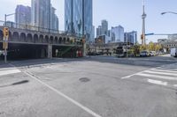 the street view in a city shows a car on a crosswalk in a busy city