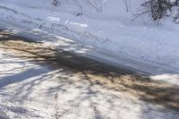 the snow is melting down on the road in the wintertime and it is still clear