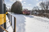 Ontario Train on Coastal Track with Snow Covered Trees