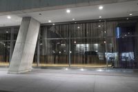 the door to an office building is open for business and to use as the front entrance