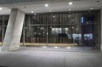 the door to an office building is open for business and to use as the front entrance