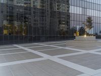 a white bench sits in the middle of an empty sidewalk between two tall buildings and buildings