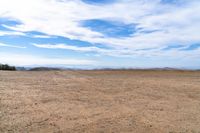 there are no people in this open desert area while there is no vegetation at the right