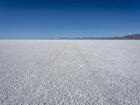 wide view of a barren, salt flat in the desert in arizona's eastern basin