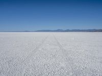 wide view of a barren, salt flat in the desert in arizona's eastern basin