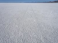 wide view of a barren, salt flat in the desert in arizona's eastern basin