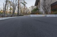 the skateboarder does tricks on the street on his board at the park of the museum