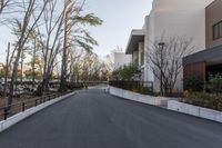 the skateboarder does tricks on the street on his board at the park of the museum