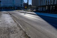 a photo of the empty street on a sunny day in chicago, united states the image depicts the cityscape and downtown buildings