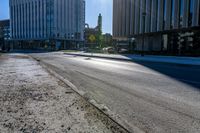 a photo of the empty street on a sunny day in chicago, united states the image depicts the cityscape and downtown buildings