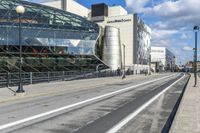 the streets are empty and a building has many different buildings on top of it in a city