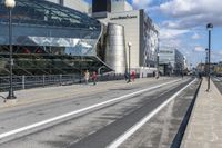 the streets are empty and a building has many different buildings on top of it in a city