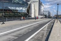 the streets are empty and a building has many different buildings on top of it in a city