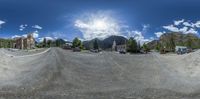 there is a 360 - angle view of the parking lot at an outside mall on a nice sunny day