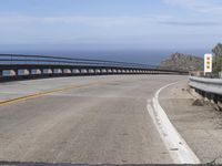 The Pacific Coast Highway in the USA: Ocean and Bridge