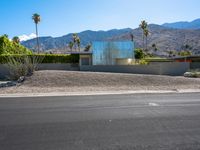 modern house in the mountains near palm springs, california usa, viewed from the road