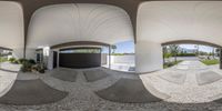 an 360 view of a parking garage with multiple angles of mirrors to show the street below