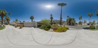 an upside down fish eye lens view of the skateboard ramp at a park or resort