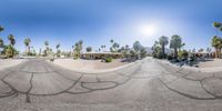 multiple panoramic images of a street with palm trees in the background and buildings