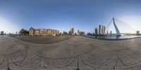 a panoramic view of a city as seen through an eye lens with reflection