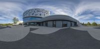 360 - camera panoramic of the top of a building near a skate park