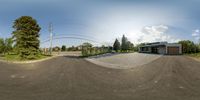 a panoramic view of a small intersection on a clear day in canada street