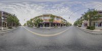 a view of a street from behind a fisheye lens panoramic lensing