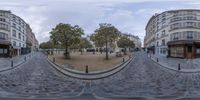 a cobble stone path on a street in paris, france through a fisheye lens