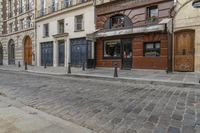 Paris Facade: Cobblestone Streets and Classic Architecture